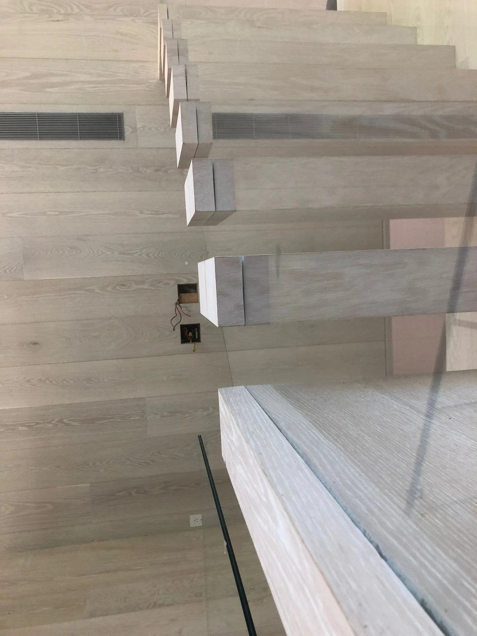 Closeup custom stairs with glass