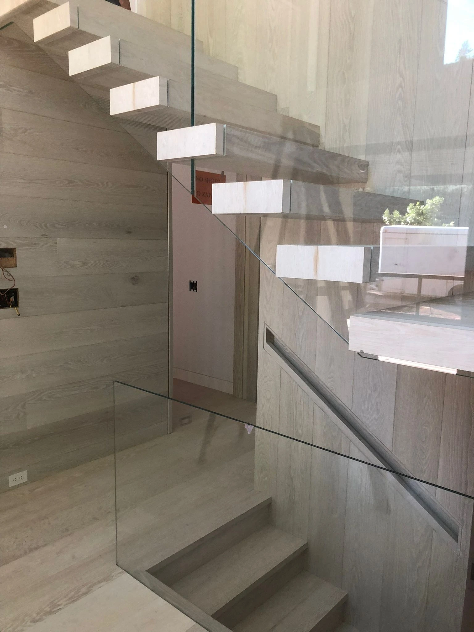 Custom wooden stairs with glass